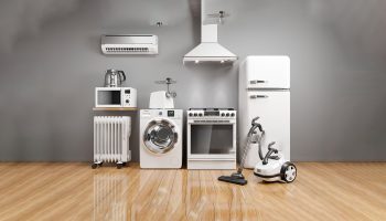 Set of home kitchen appliances in the room on the wall background. 3D render